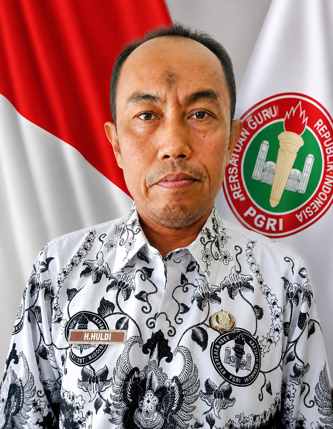 H. HULDI, S.Ag,. M.M.
